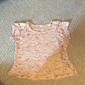 It’s a lace crop shirt